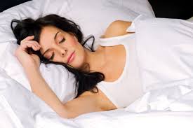 woman sleeping better and lose weight